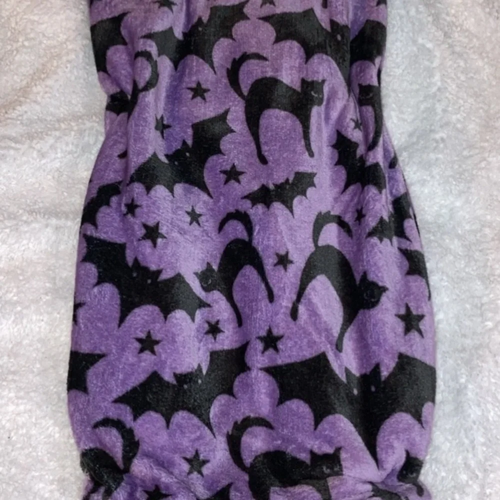 Bats and cats throw blanket